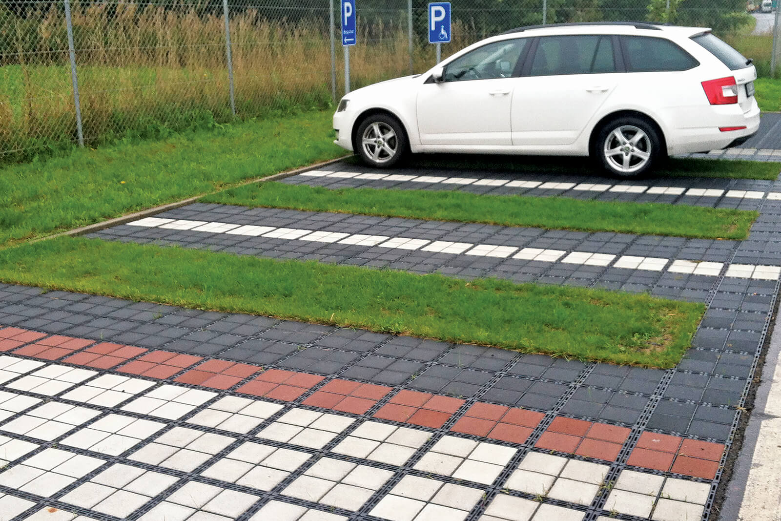 Plastic grid reinforced permeable pavement